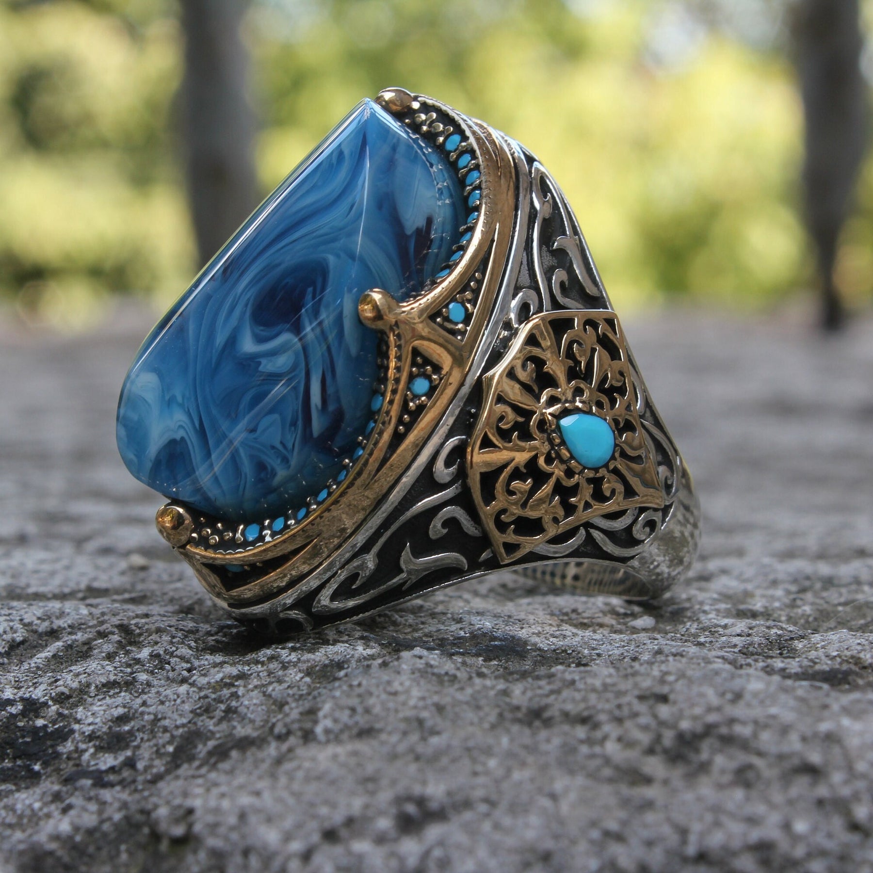 Different Cut Blue Amber Silver Ring